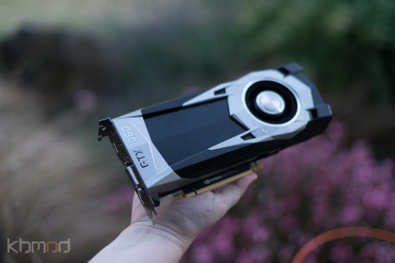 My lovely assistant holds the GTX 1060 in her hand.